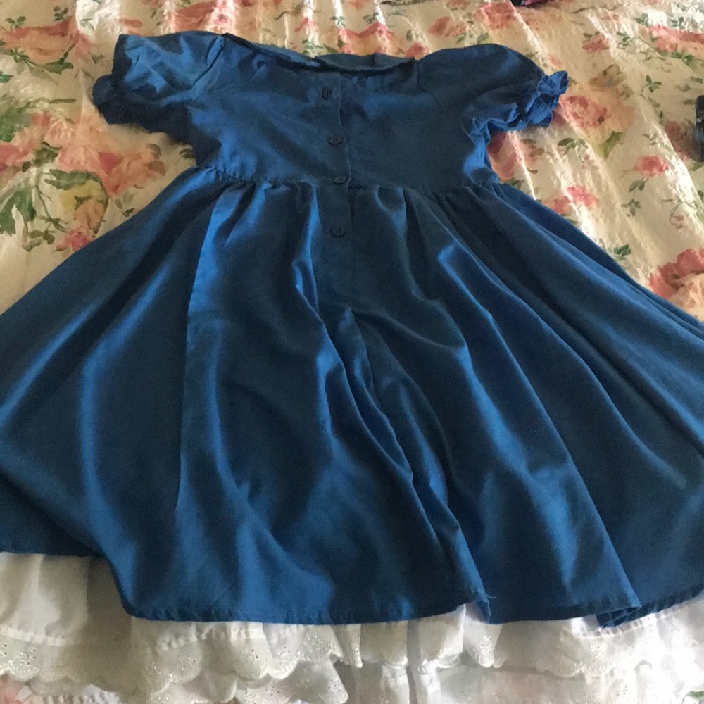 Cute blue dress with ruffles at the end